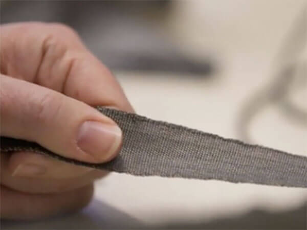 Piezoelectric yarns for truly wearable smart textile applications