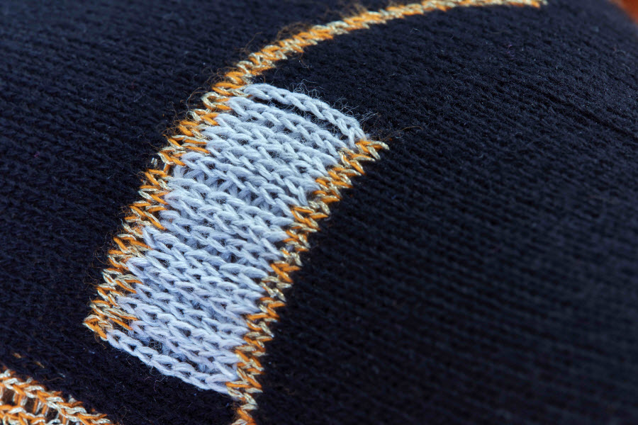 The silver coloured yarns are a silver-coated nylon and stainless steel yarns are used too. Image credit Stefan Zander.jpg