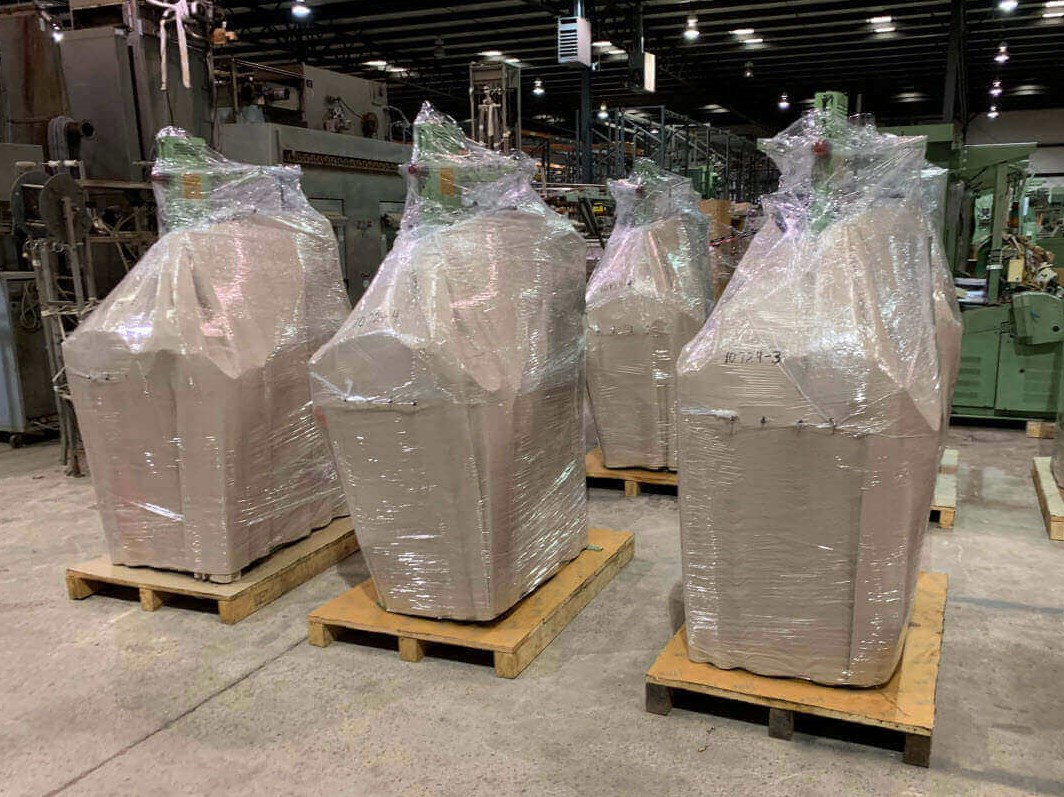 An image of some refurbished machines ready to be crated and shipped off.jpg