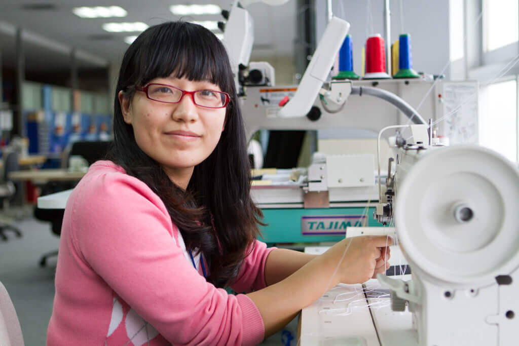 A coats employee in China.jpg