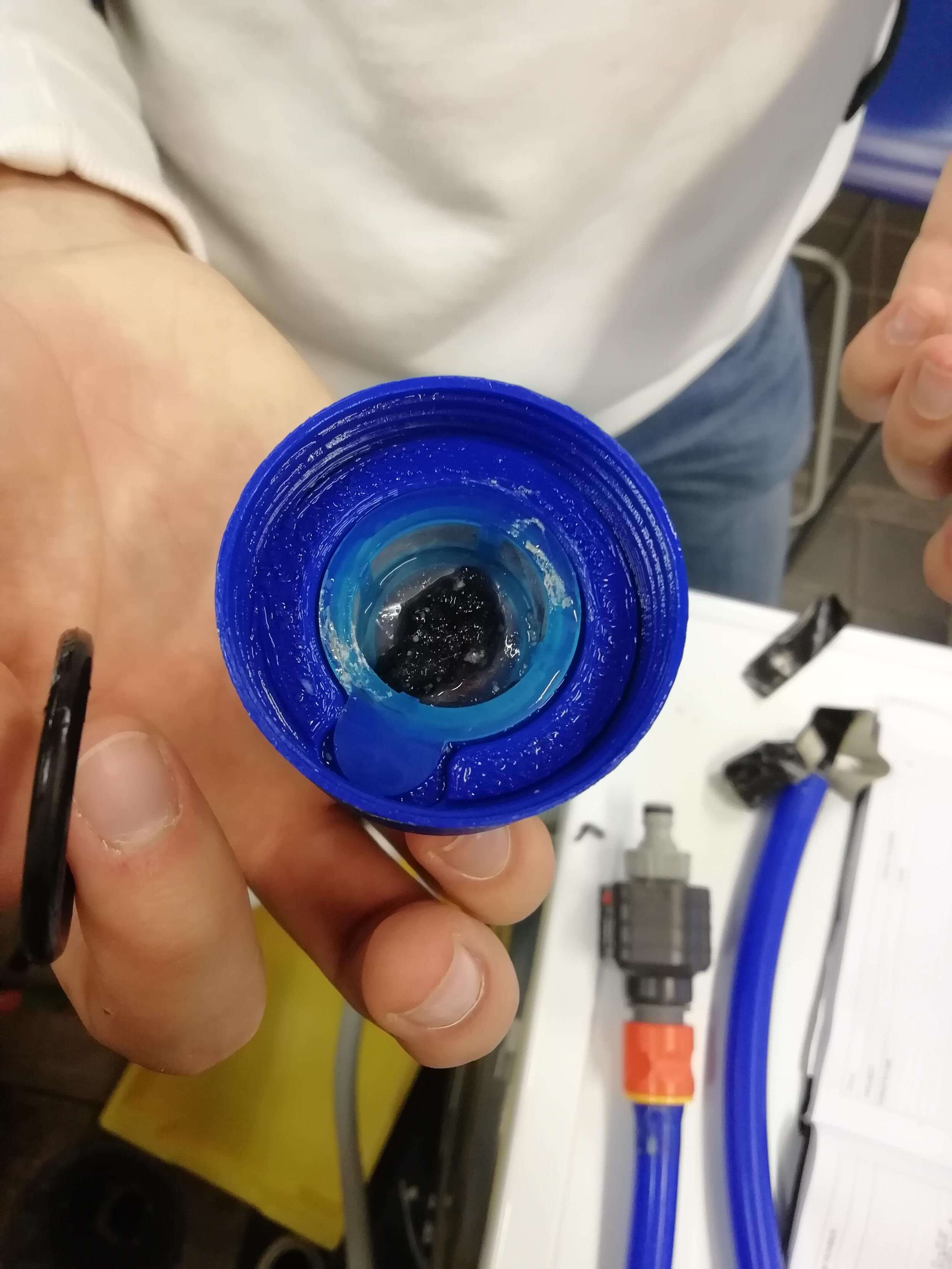 Microfibres caught in the filter.jpeg