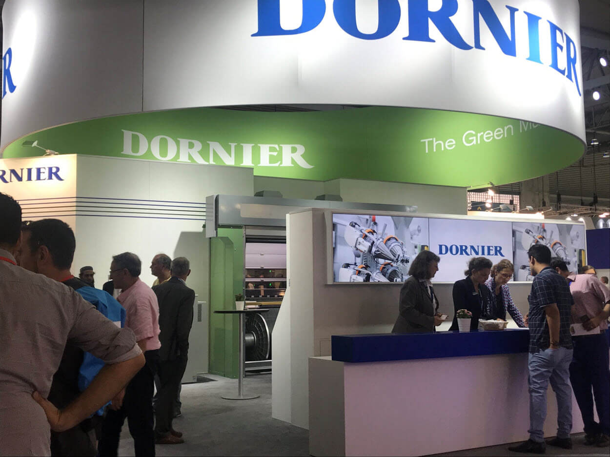 The Dornier booth at ITMA 2019.jpg