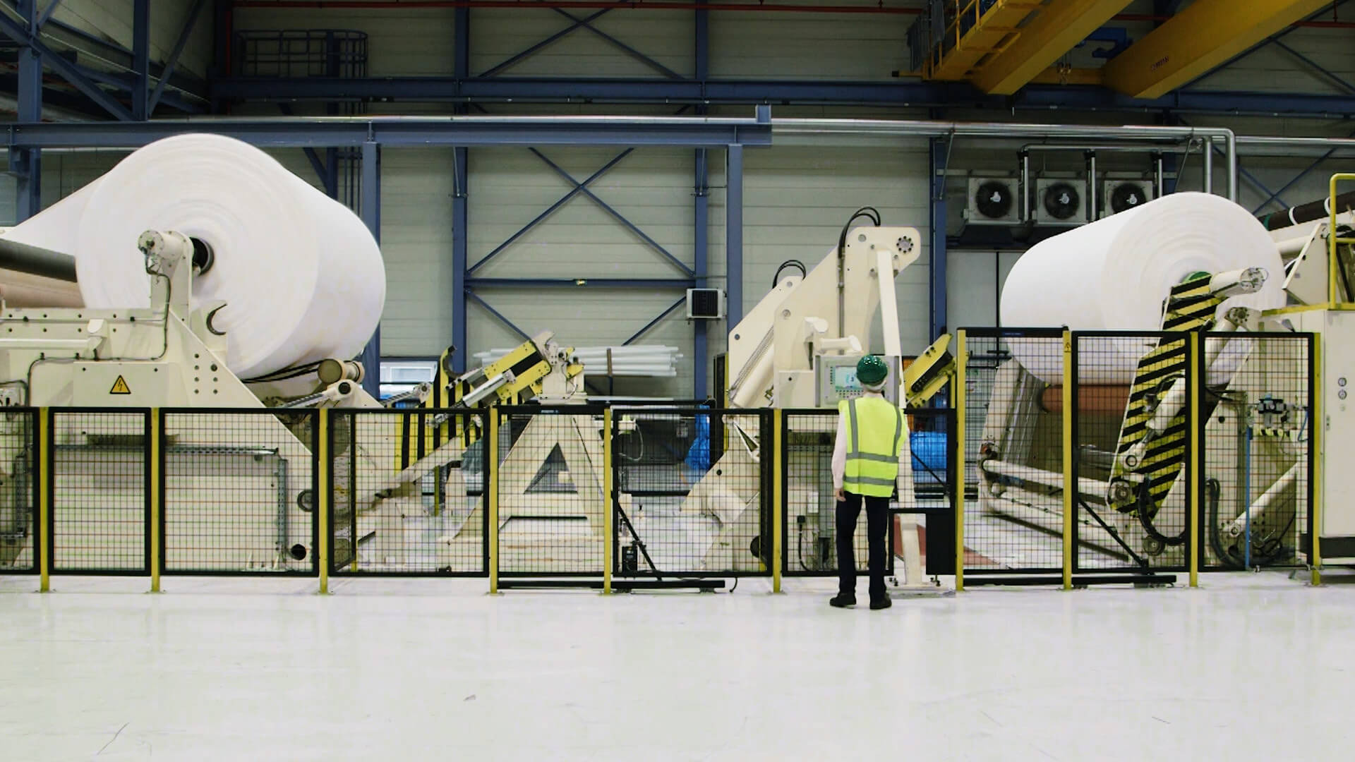 Nonwoven rolls, bound for applications such as face masks and disinfecting wipes, at a Berry Global facility.jpg
