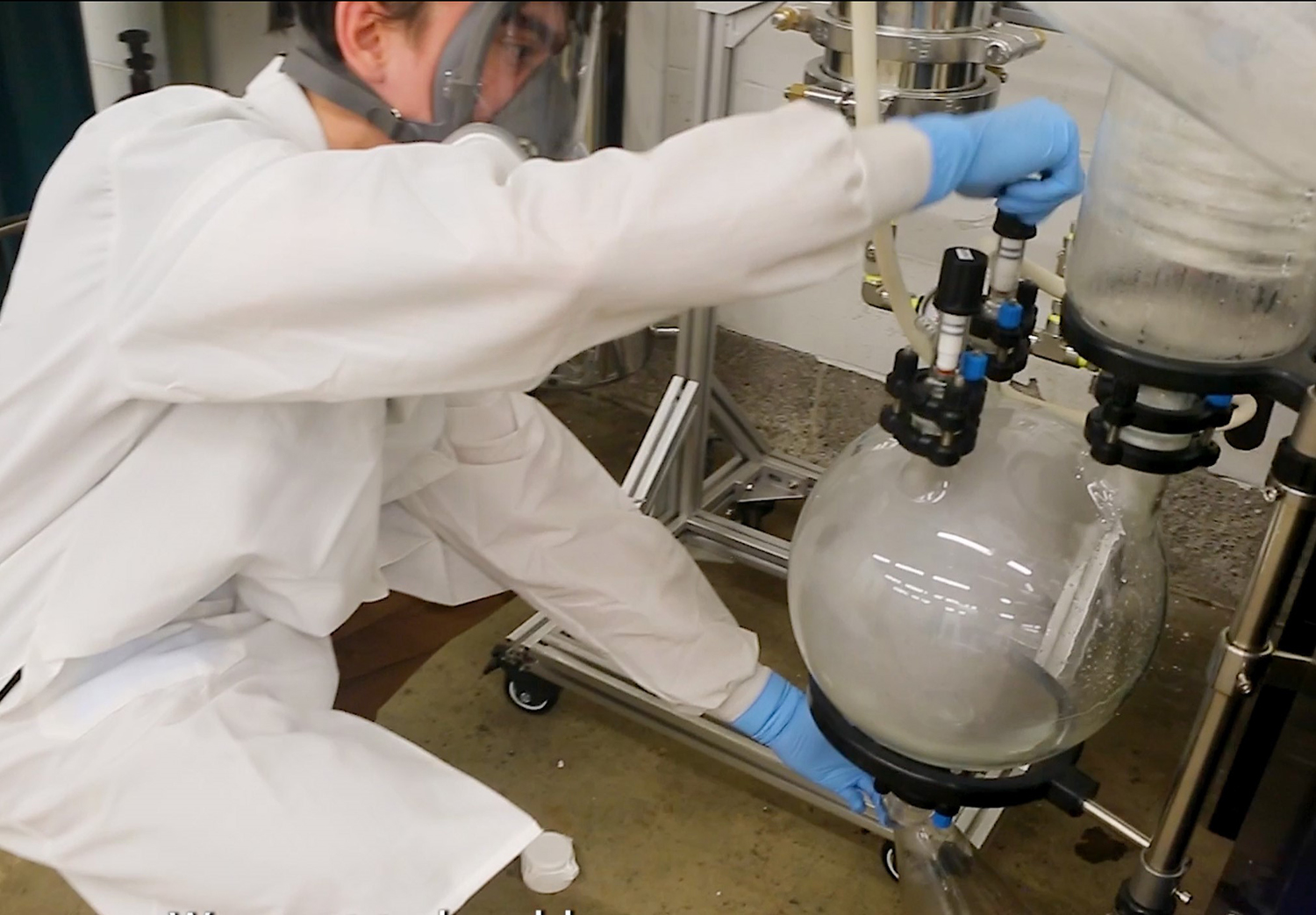 A Claros scientist de-stills PFAS waste to a highly concentrated solution, making it more cost-effective and efficient to destroy in high quantities